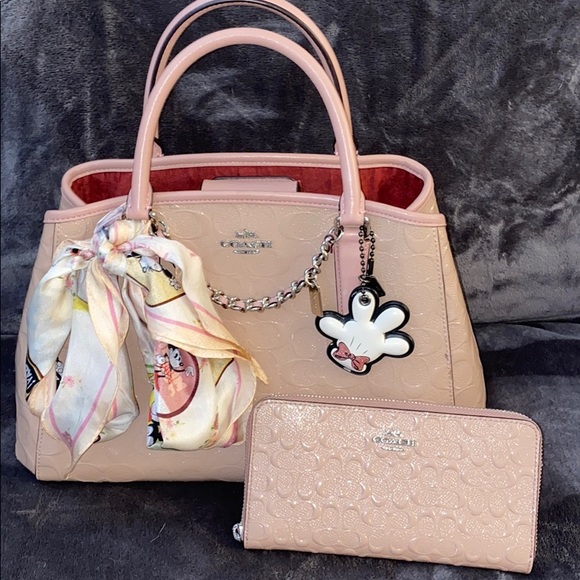 Coach Handbags - Pink Coach Disney handbag and zip wallet